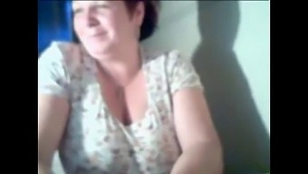 Older Woman Flaunts Her Breasts On Webcam